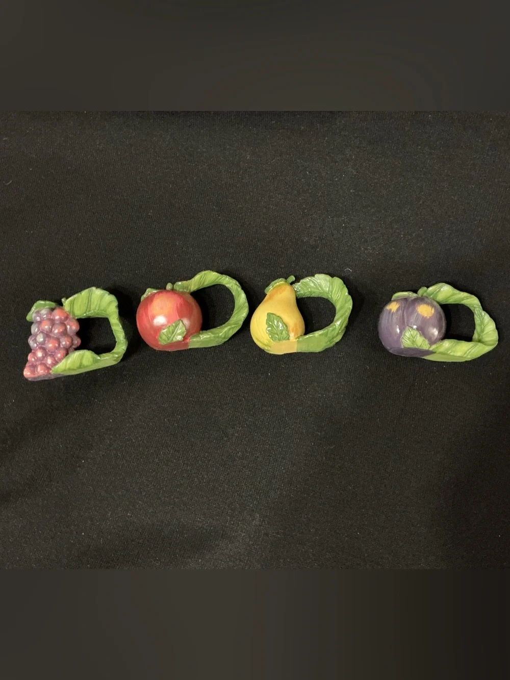 Sonoma Fruit Ceramic Napkin Rings in Green, Red, Yellow, Purple & 1 basket